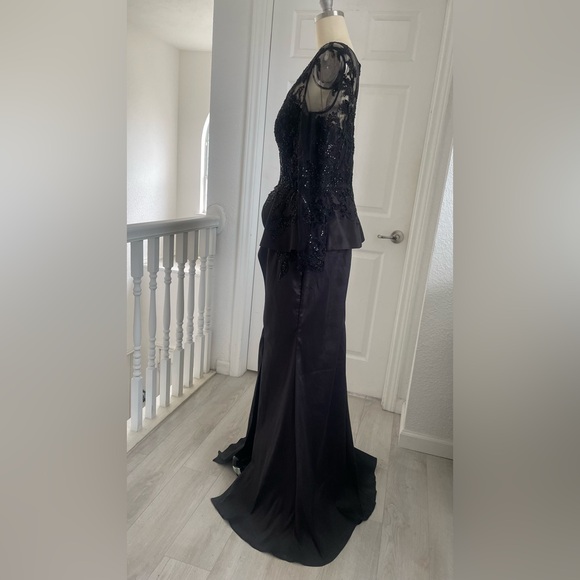 Terani Couture Embroidered Long Sleeve Front Slit Ruffled Mermaid Gown.